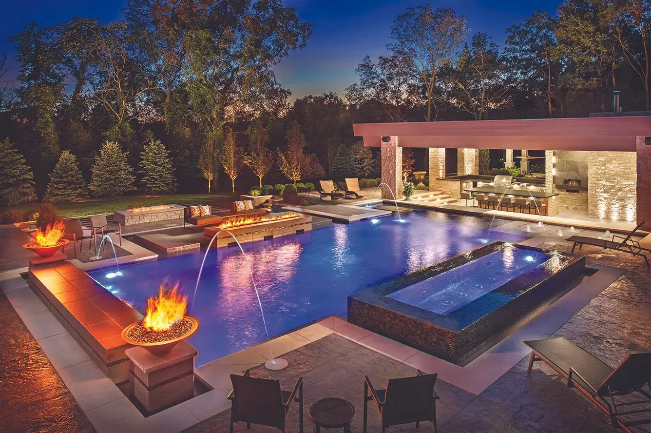 Luxurious pool grotto with cascading waterfalls, providing an intimate and tranquil outdoor retreat